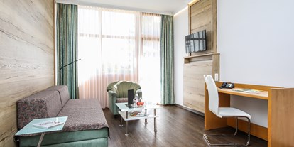 Golfurlaub - Haarbach - Junior Suite Wohnraum - AktiVital Hotel 