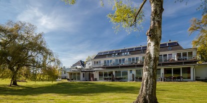 Golfurlaub - Umgebungsschwerpunkt: Meer - Ostsee - Gartenansicht Gästehaus - HofHotel Krähenberg