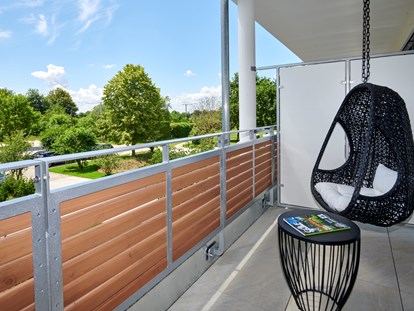 Golfurlaub - Wäschetrockner - Balkon Komfort - Doppelzimmer Südseite - Bachhof Resort Straubing - Hotel und Apartments