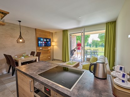 Golfurlaub - Golf-Schläger Verleih - 5* Ferienhaus - Apartment, Typ 1 mittlere Lage - Bachhof Resort Straubing - Hotel und Apartments