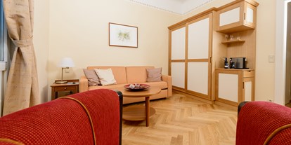 Golfurlaub - Bademantel - Gumpoldskirchen - Wohnraum Suite - Hotel Herzoghof