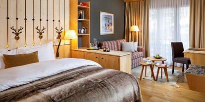 Golfurlaub - King Size Bett - Schweiz - Hotel Piz Buin 
