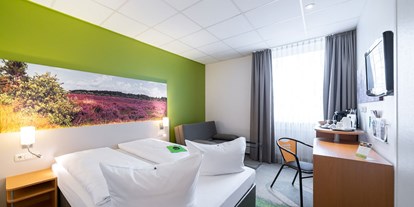 Golfurlaub - Handtuchservice - Walsrode - Doppelzimmer - ANDERS Hotel Walsrode