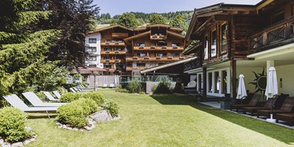 Golfurlaub - Zimmersafe - Pinzgau - Garten - Hotel Sonne