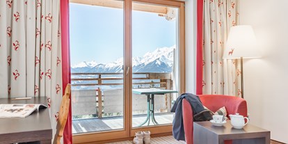 Golfurlaub - Golfkurse vom Hotel organisiert - Wohnkomfort im Doppelzimmer Weitsicht Deluxe - Inntalerhof - DAS Panoramahotel