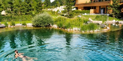 Golfurlaub - Pools: Infinity Pool - Gartenteich - Wellnesshotel Eggerwirt 