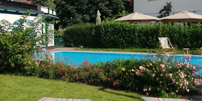 Golfurlaub - Garten - Grassau (Landkreis Traunstein) - Aussenpool - Romantik Spa Hotel Elixhauser Wirt